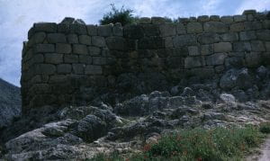 view of stone wall