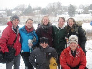 The team after completing the Polar Bear Plunge into frozen Occum Pond during Winter Carnival
