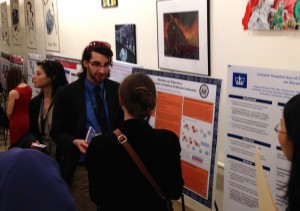 Luca discusses his poster presentation
