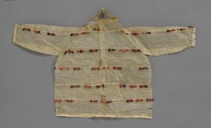 Sugpiaq (Alutiiq), Western Arctic, Child's Bear Gut Parka, collected 1905, bear gut (intestine), wool yarn, commercial thread, cotton cloth trim, leather. Bequest of Frank C. and Clara G. Churchill; 46.17.9801 