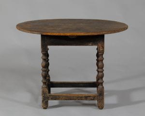 A pine and maple oval top tea table. 